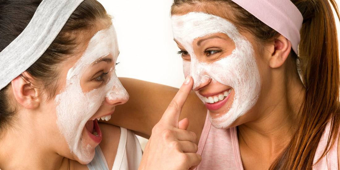 Teenagers wearing skincare masks